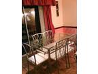 DINNING TABLE,  Clear glass top dining metal table with....